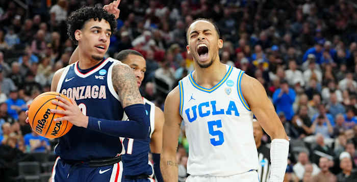 Mar 23, 2023; Las Vegas, NV, USA; UCLA Bruins guard Amari Bailey (5) reacts after a play against the Gonzaga Bulldogs during the first half at T-Mobile Arena.